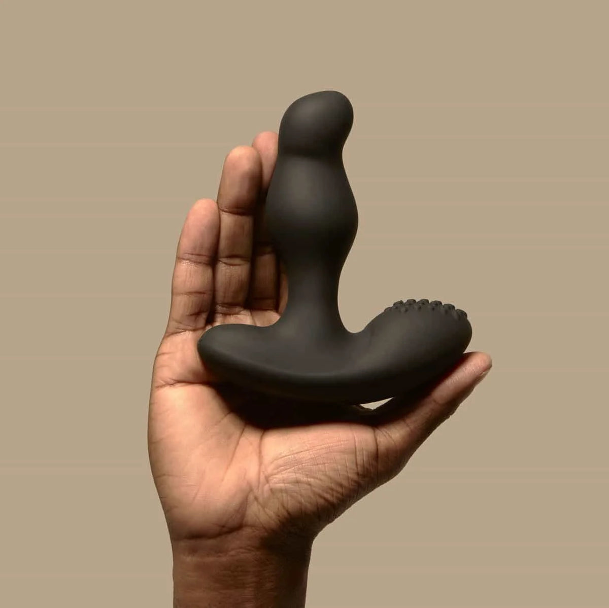 Hand holding the GIDDI Thor rotating prostate massager