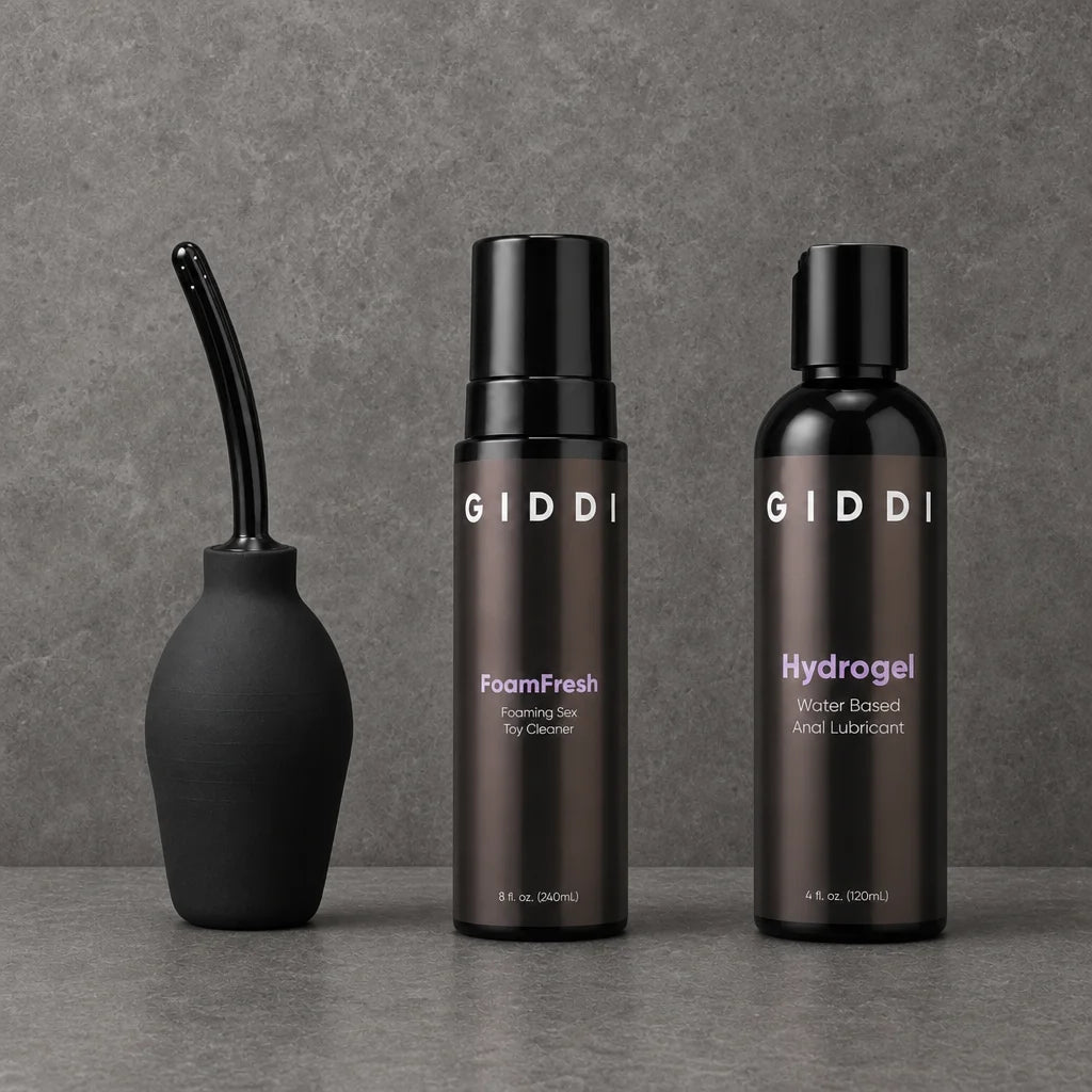 GIDDI FoamFresh toy cleaner and Hydrogel water-based anal lubricant next to an anal douche